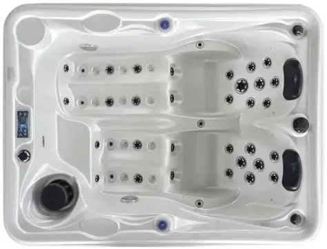 Cadă cu hidromasaj compactă HOME 210×160×77 cm, cu un design alb, are două locuri pentru șezut, dotată cu jeturi de hidromasaj și un panou de control pe margine, fiind potrivită pentru utilizare în interior sau pe terasă.